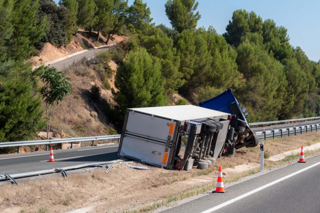 Truck accident, overturned at the highway